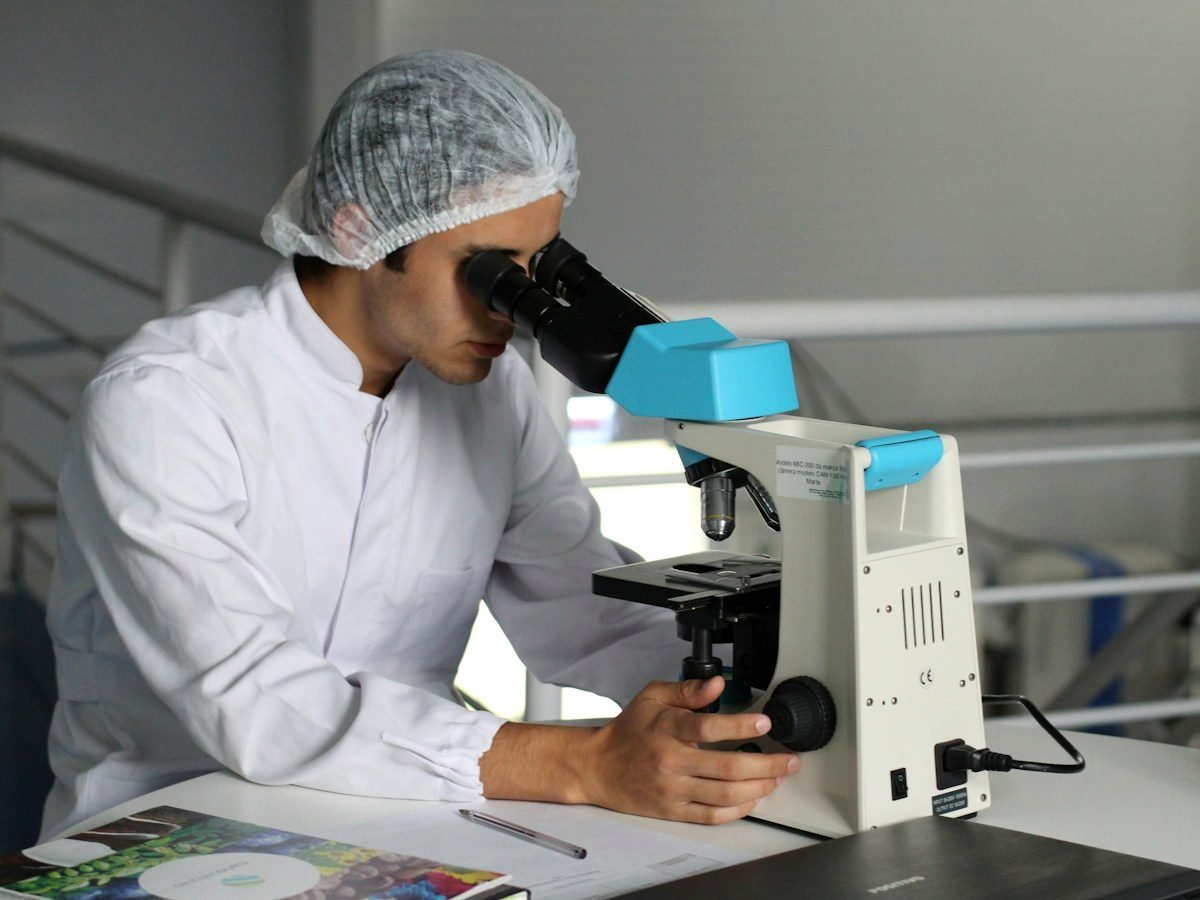 Laboratory technician running an analysis on a produce sample